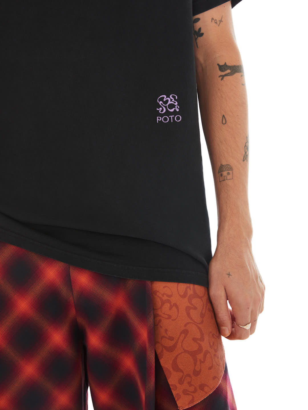 details of black t-shirt with monogram embroided