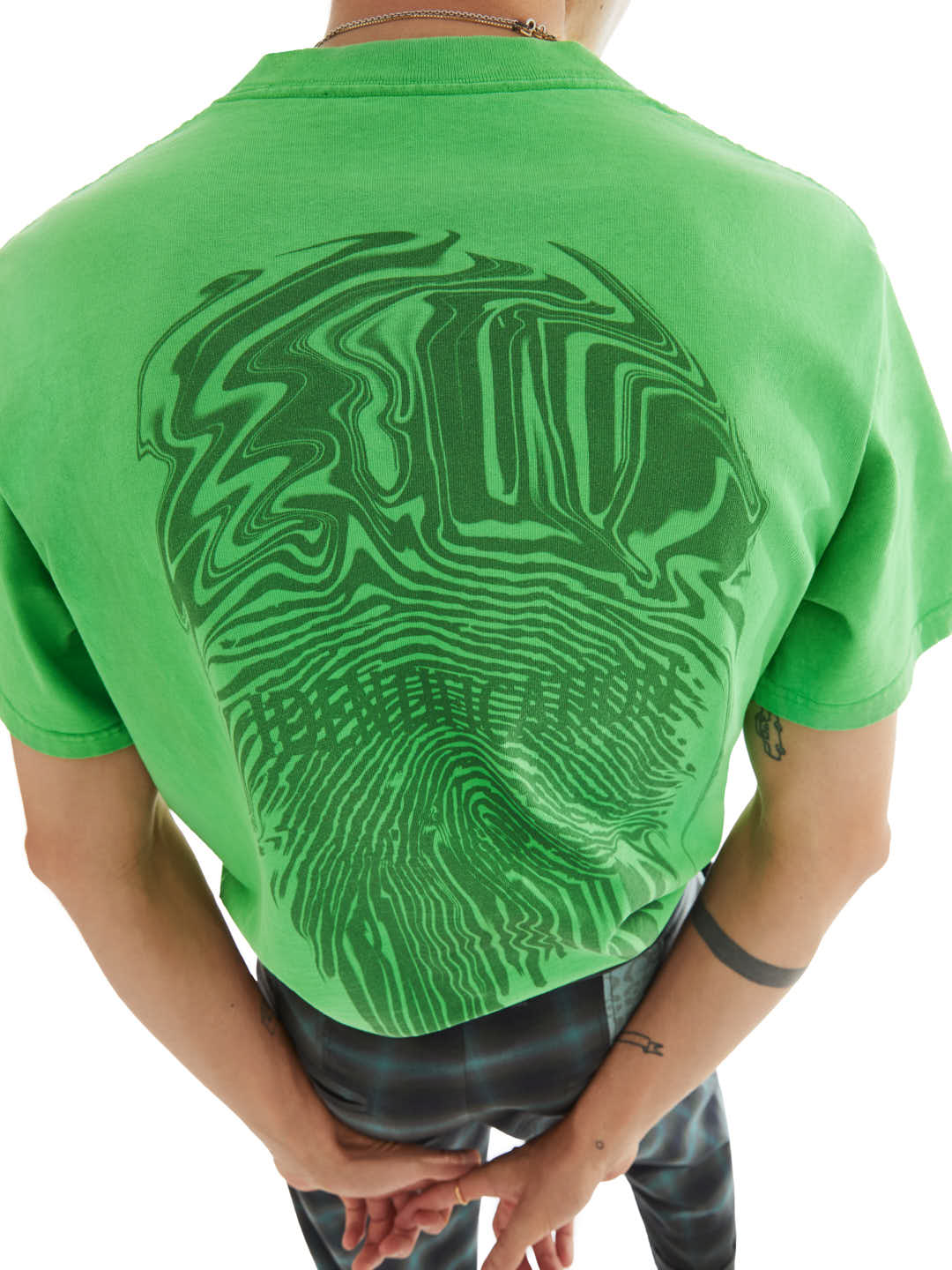 back of green t-shirt with fingerprint print 