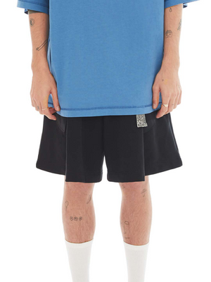 Black tailored shorts with exposed pockets. 