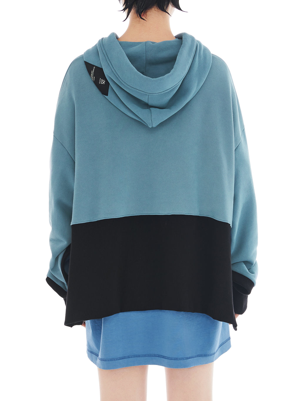 back of teal and black poncho with maxi slit on the side